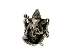 A large silver ring depicting Ganesha, size T.