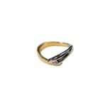 An 18ct yellow gold and white gold wishbone ring with diamond centre, size L.