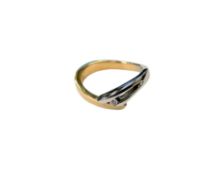 An 18ct yellow gold and white gold wishbone ring with diamond centre, size L.