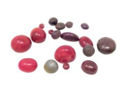 A group of loose rubies totalling 160 carats