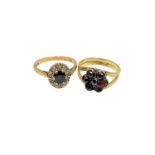 An 18ct gold sapphire and diamond ring and a gold garnet ring (2)