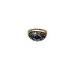 An antique 18ct gold sapphire and diamond ring