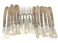 Sixteen mother of pearl handled EPNS knives and forks