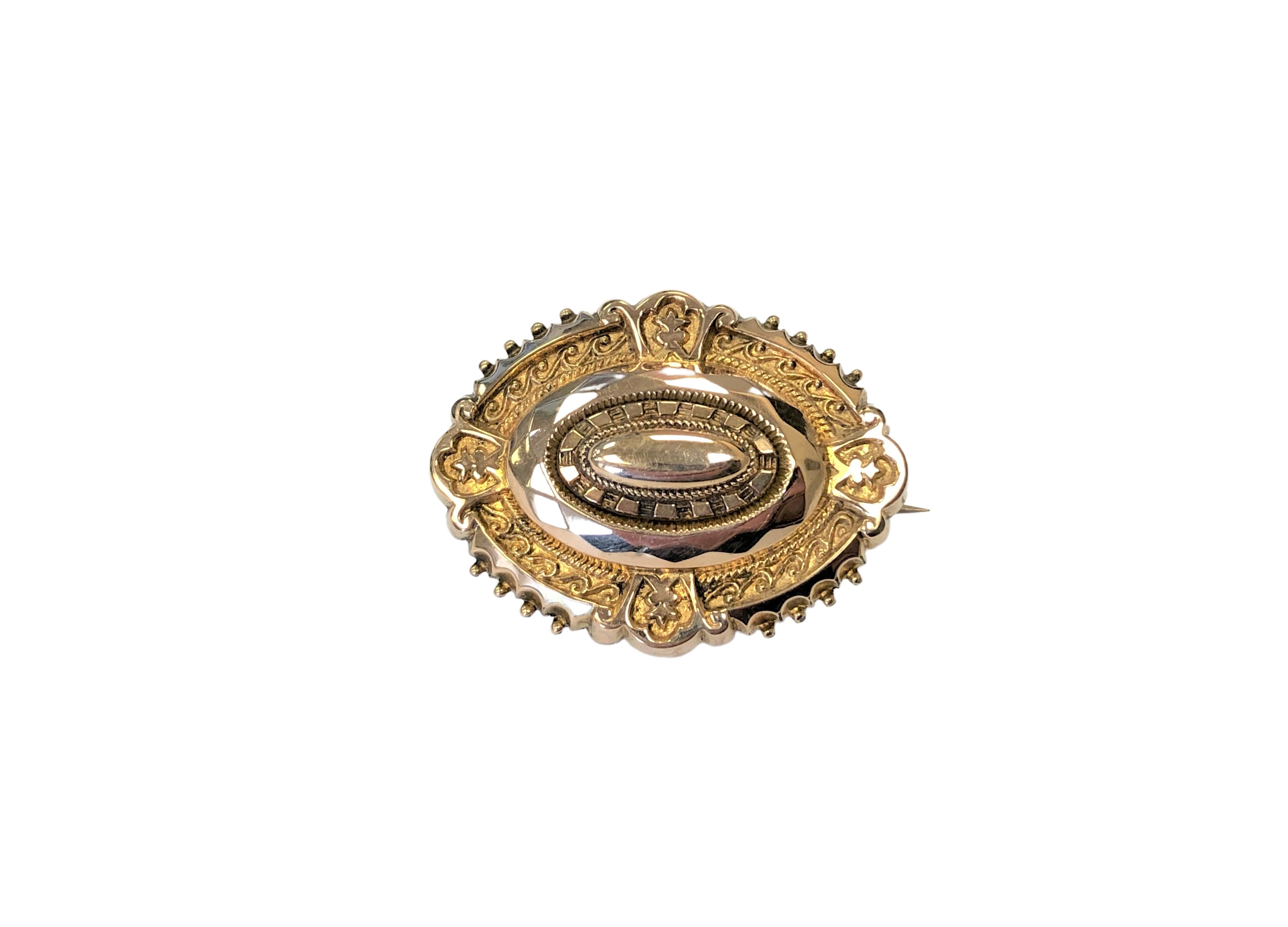 A vintage 9ct gold brooch