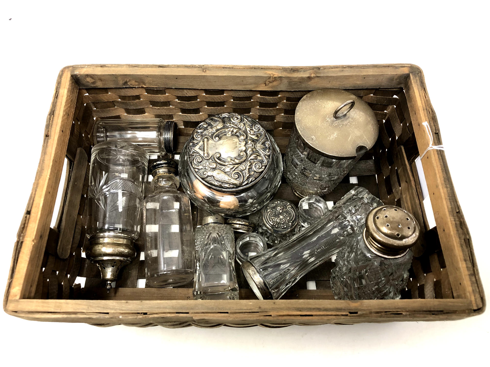 A box of silver items; lidded pots,
