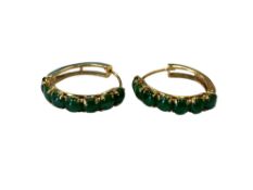 A pair of high carat gold jade earrings CONDITION REPORT: 4.