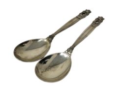 A pair of Georg Jensen acorn pattern spoons, length 15 cm.