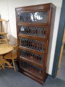 A 19th century mahogany five tier stacking bookcase with leaded glass doors CONDITION