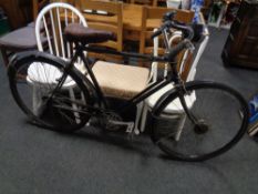 A mid 20th century hand built road bike with leather saddle