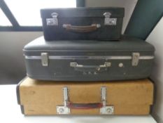 Three vintage luggage cases