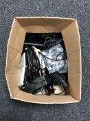 A box of electrical items to include two digital alarm clocks, a Doro 5516 mobile phone,