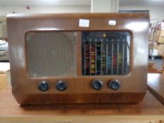 A vintage walnut cased Pye valve radio