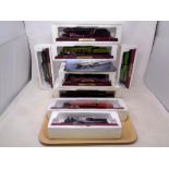 A tray of twelve Atlas Editions models of locomotives with accompanying magazines