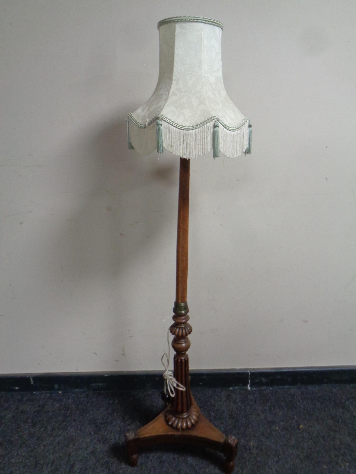 A Regency (and later) brass inlaid mahogany pole screen stand converted to a standard lamp