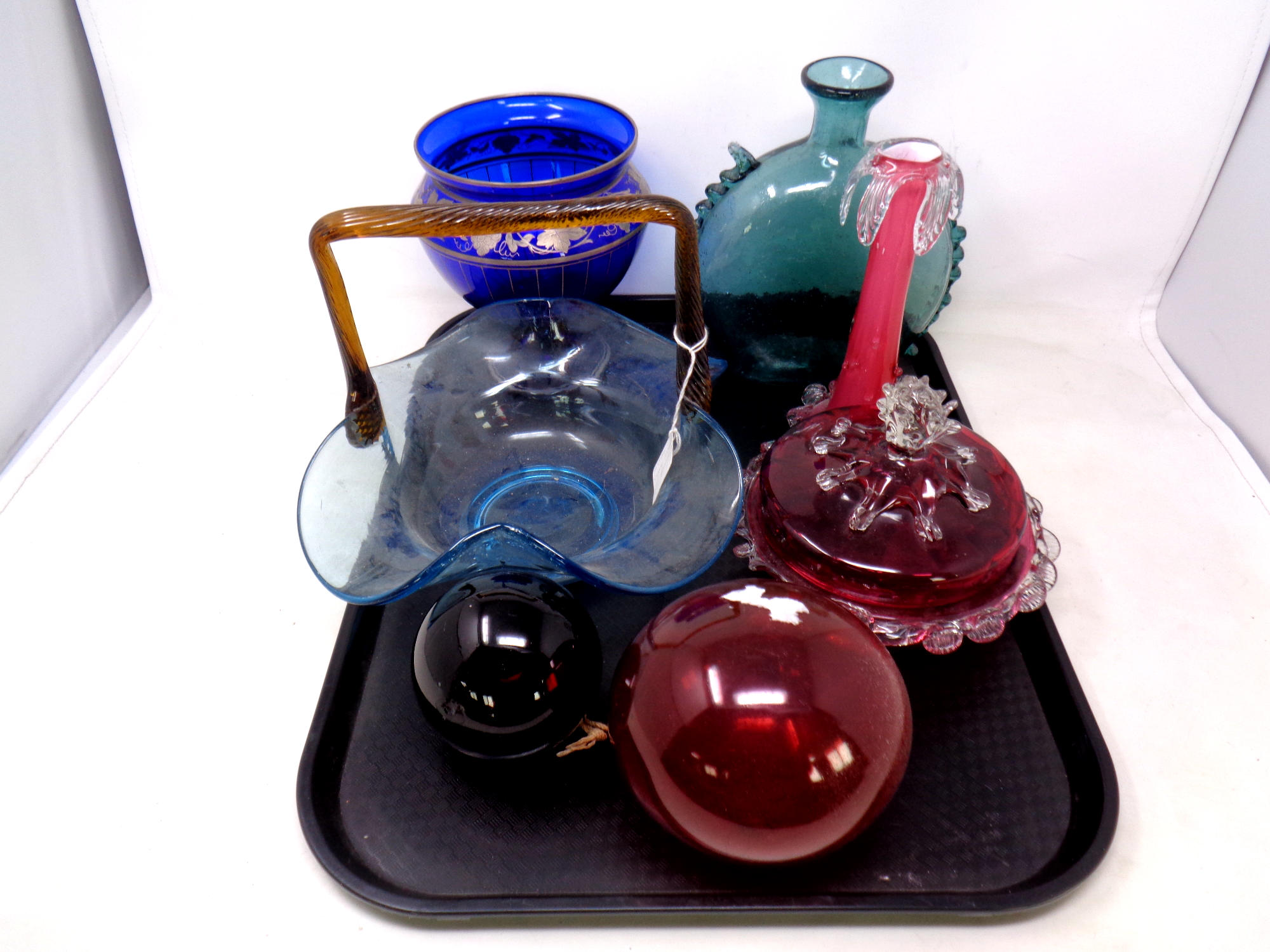 A tray of antique and later glass ware - cranberry glass, lidded dish, glass baubles,