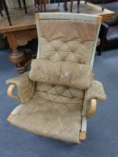 A 20th century bentwood armchair in tan leather