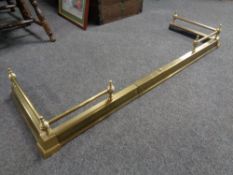 A 19th century brass telescopic fire curb