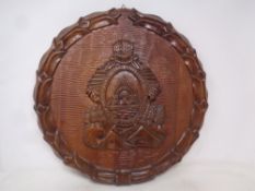 A carved oak plaque to commemorate Honduras independence