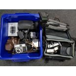 A box and a camera bag of assorted vintage and digital cameras, tripod,