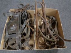 Two boxes of vintage leather horse tack