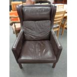 A mid 20th century Danish brown leather chair