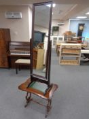 A cheval mirror and an occasional table