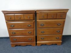 A six piece American style bedroom suite comprising two four-drawer chests, pair of bedside stands,