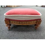 A Victorian inlaid mahogany footstool in red dralon