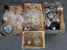 Four boxes of a large quantity of assorted pressed glass,