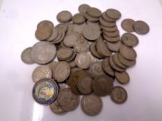 A bag containing a quantity of British coins to include shillings, assorted crowns,