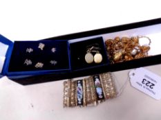 A collection of Oriental style jewellery including panel cuff bracelet, oval earrings,