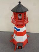 A floor standing lamp in the form of a lighthouse (continental wiring)