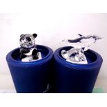 Two Swarovski crystal panda and dolphin ornaments,