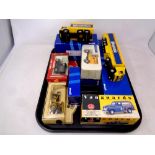 A tray of boxed die cast vehicles - four Corgi Classics Weetabix delivery vans,