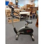 Two exercise bikes by Kettler and Abitica