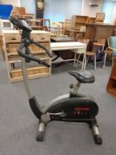 Two exercise bikes by Kettler and Abitica