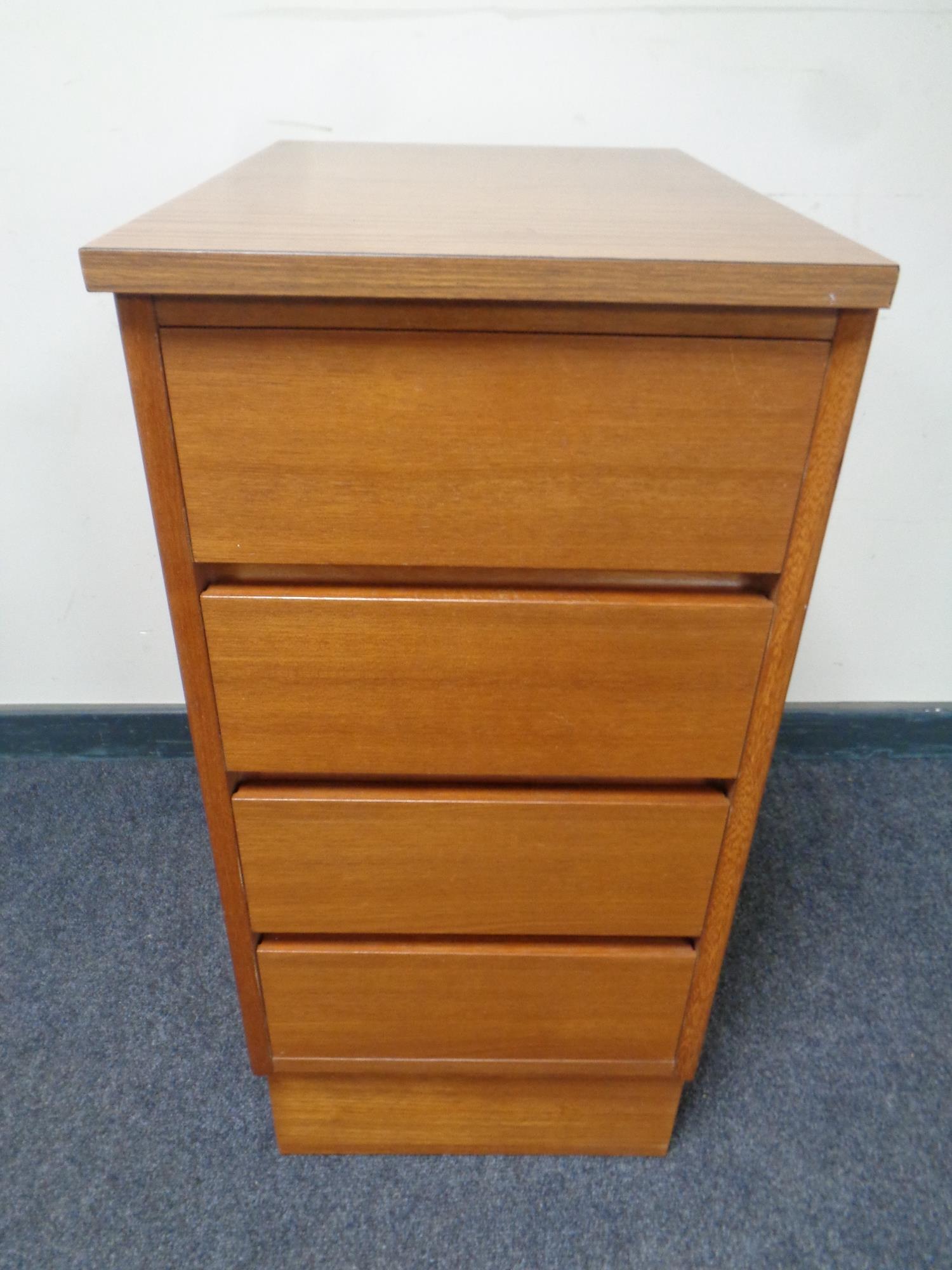 A mid 20th century teak melamine topped chest