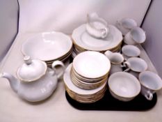 Thirty-nine pieces of Bohemian white and gilt tea and dinner china