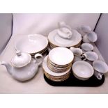 Thirty-nine pieces of Bohemian white and gilt tea and dinner china