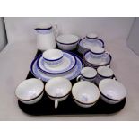 A tray of twenty six pieces of 19th century Royal Crown Derby blue and white rose pattern china