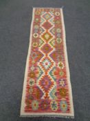 A Chobi Kilim runner 194 cm x 58 cm