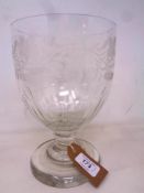 An antique glass chalice, with etched foliage decoration, on circular base, diameter at top 15 cm,