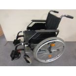 A Dietz folding light weight wheel chair