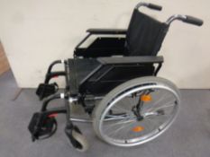 A Dietz folding light weight wheel chair