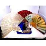 A tray of a collection of antique and later hand fans together with an antique beaded purse