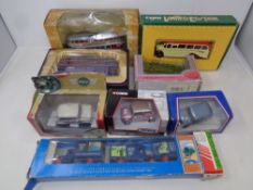 A box of boxed die cast vehicles - First Edition bus, Corgi Queen II Jubilee bus,