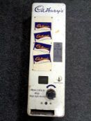A mid 20th century enamelled wall mounted Cadbury's Chocolate vending machine