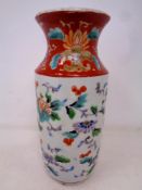A Chinese glazed porcelain vase decorated with birds and foliage. Height 19.