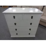 An Edwardian oak painted five drawer chest