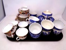 A tray of part antique Osbourne china Fanfare tea service together with nineteen pieces of